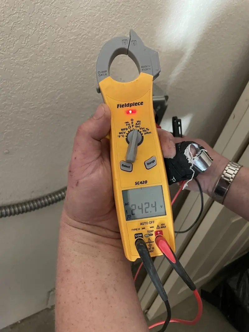 Voltage testing with clamp meter during Generator Installation in Surfside